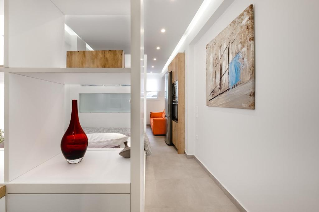 Posteľ alebo postele v izbe v ubytovaní New Luxury Studio in the Heart of Thiseio.