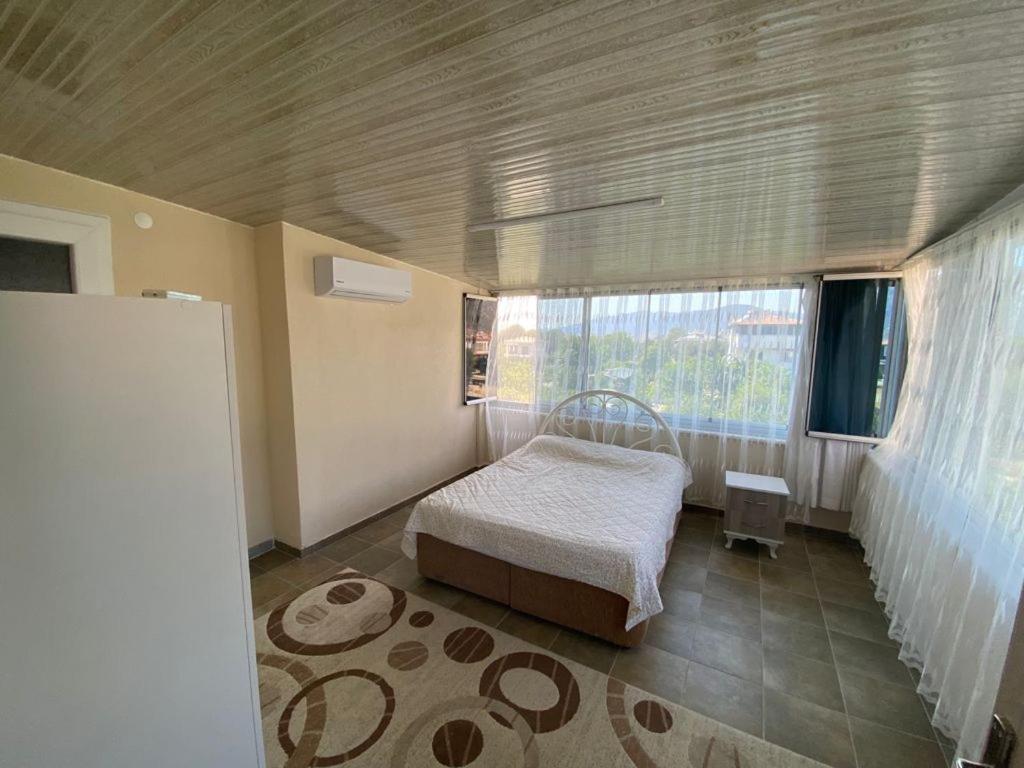 Postel nebo postele na pokoji v ubytování Mandalin Butik