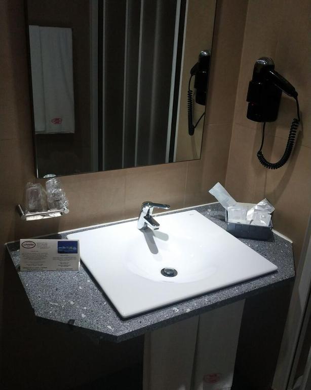 Koupelna v ubytování Hotel Comodoro