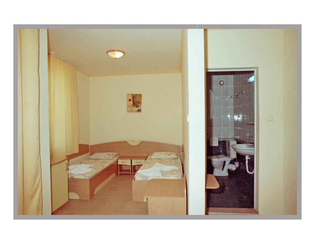 Postel nebo postele na pokoji v ubytování Hotel Apart