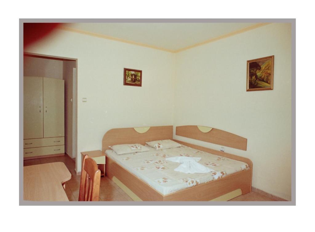 Postel nebo postele na pokoji v ubytování Hotel Apart