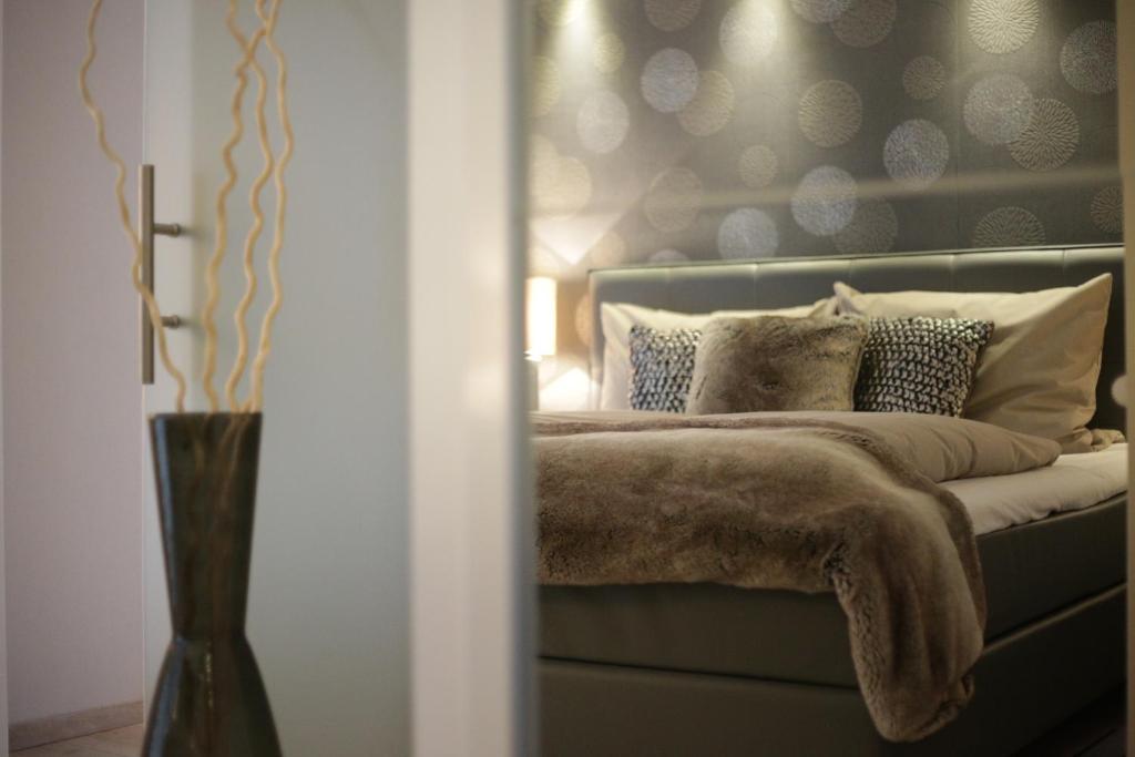 Postel nebo postele na pokoji v ubytování Appart-Hotel REB_ART