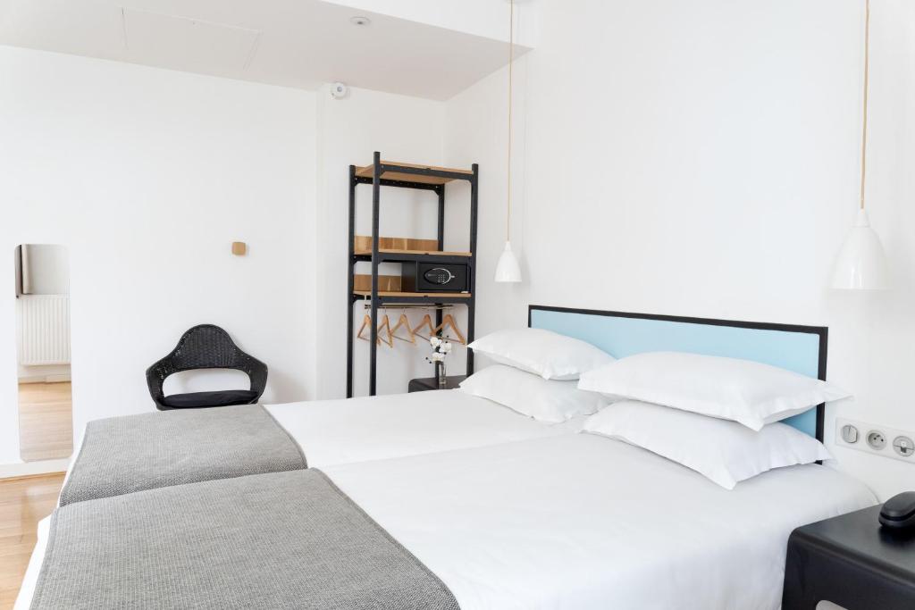 Ліжко або ліжка в номері Hotel Palm - Astotel