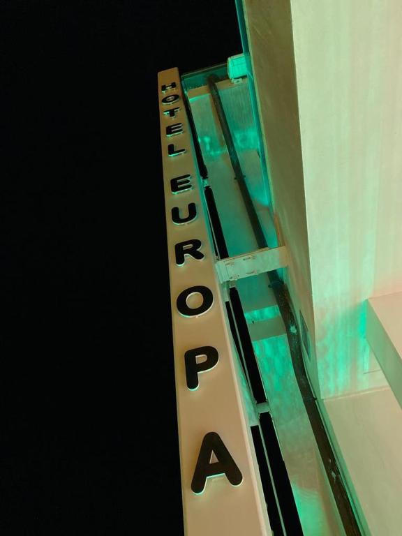 a sign with the word education on the side of a shelf at EUROPA Hotel in Vasto