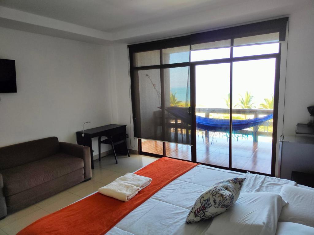 Postel nebo postele na pokoji v ubytování Hotel Punta Azul