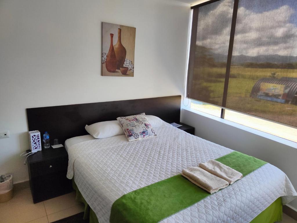 Postel nebo postele na pokoji v ubytování Hotel Punta Azul