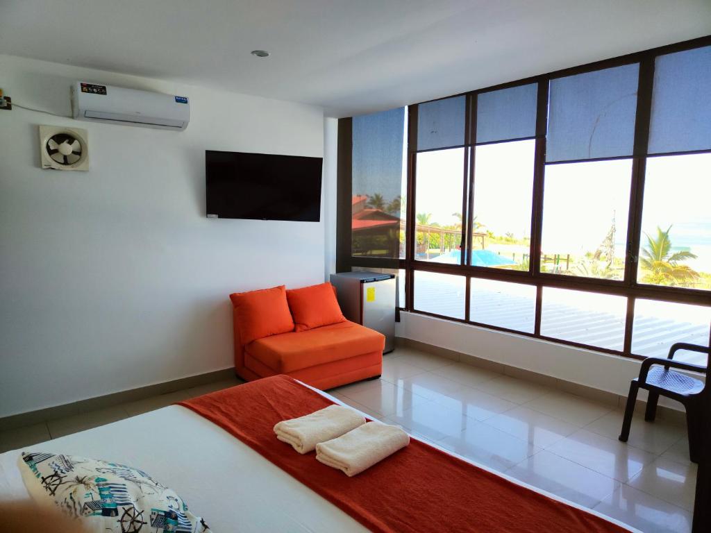 TV a/nebo společenská místnost v ubytování Hotel Punta Azul