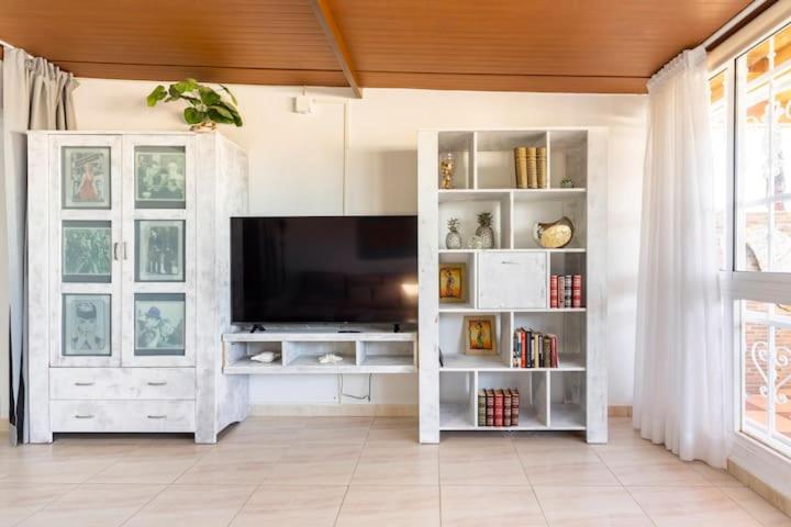 TV a/nebo společenská místnost v ubytování Vivienda Vacacional El Balcón de Villas Canarias