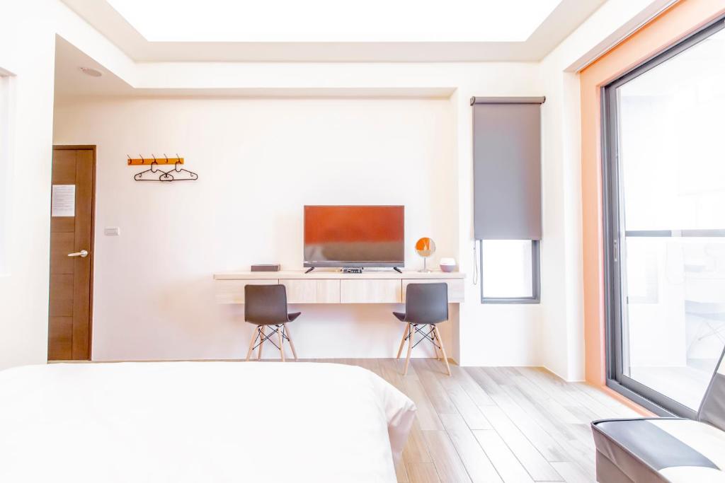 TV a/nebo společenská místnost v ubytování WOW Penghu Homestay