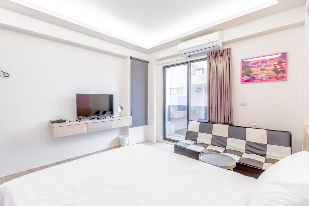 TV a/nebo společenská místnost v ubytování WOW Penghu Homestay