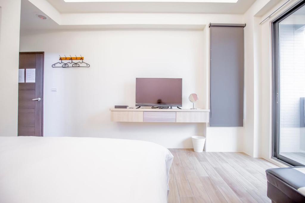 TV a/nebo společenská místnost v ubytování WOW Penghu Homestay
