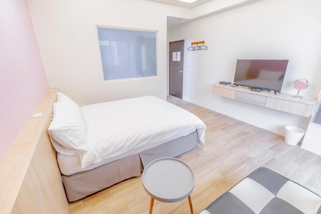 TV a/nebo společenská místnost v ubytování WOW Penghu Homestay