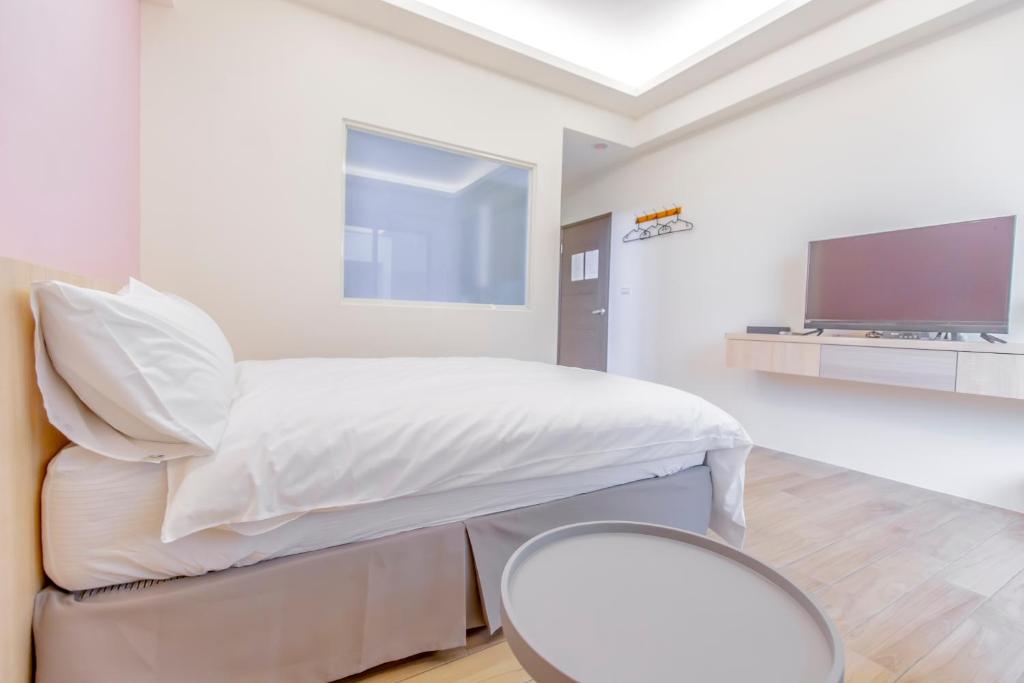 TV a/nebo společenská místnost v ubytování WOW Penghu Homestay