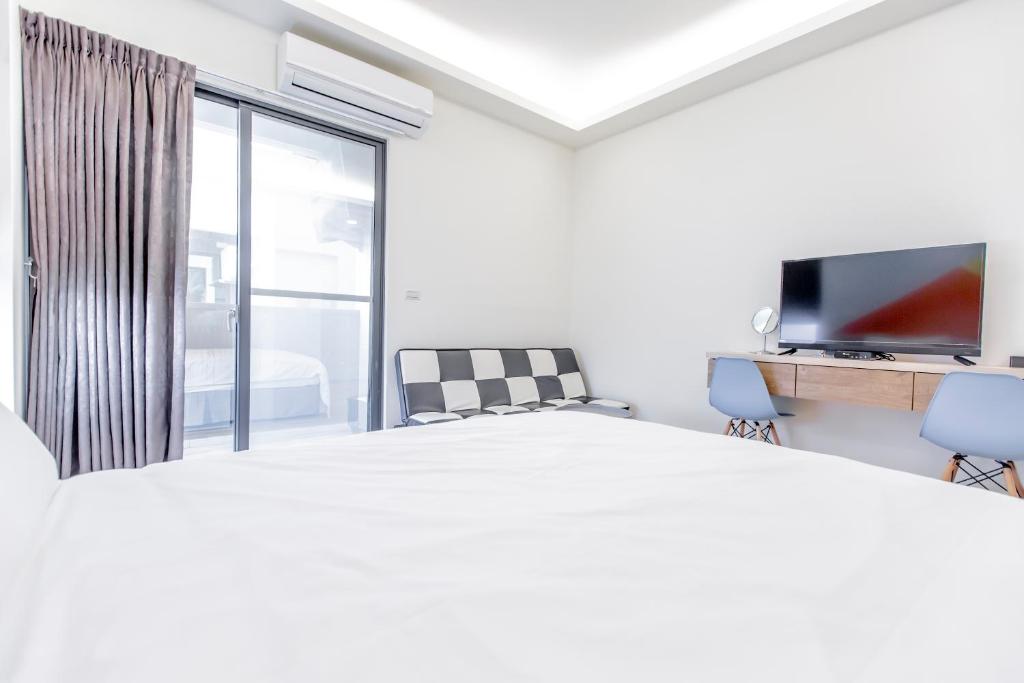 TV a/nebo společenská místnost v ubytování WOW Penghu Homestay