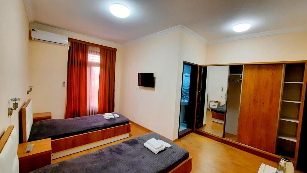 Postel nebo postele na pokoji v ubytování HOTEL KOSHKI