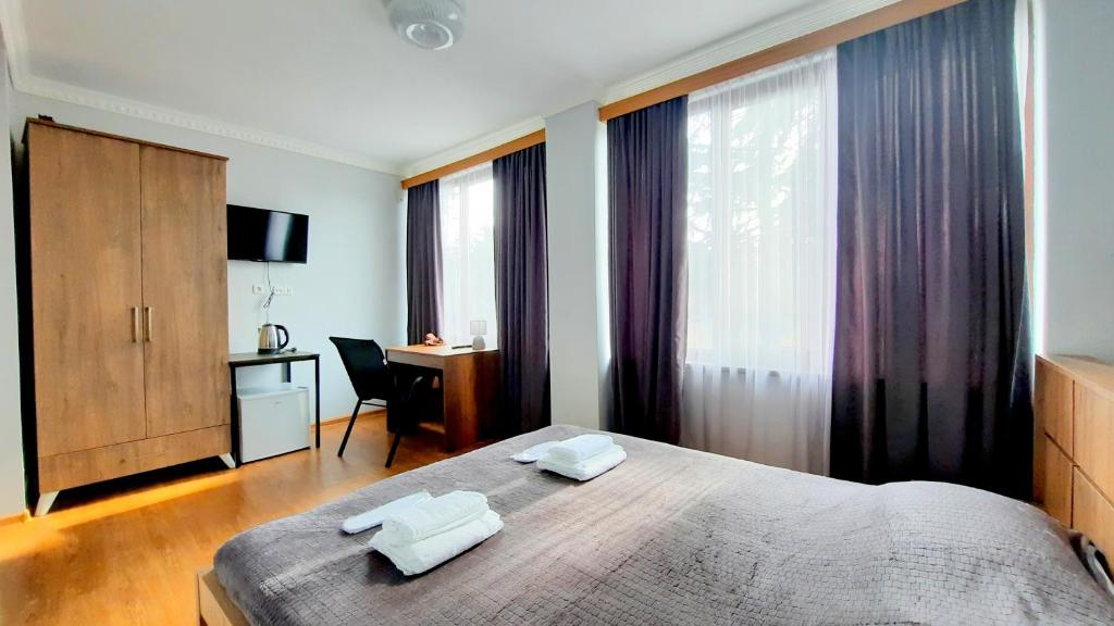 Postel nebo postele na pokoji v ubytování HOTEL KOSHKI