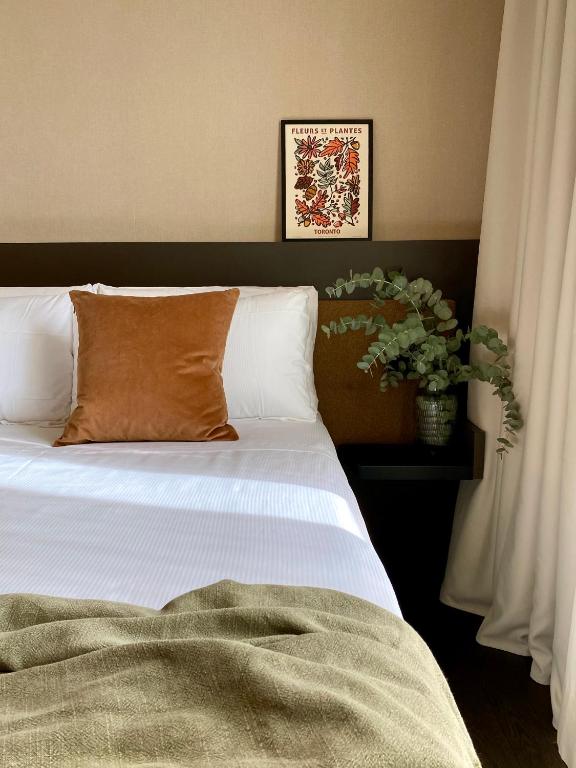 Postel nebo postele na pokoji v ubytování Litta Palace Milano
