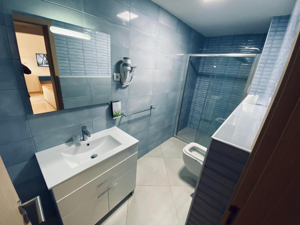 Koupelna v ubytování ApartHotel NhaTerra