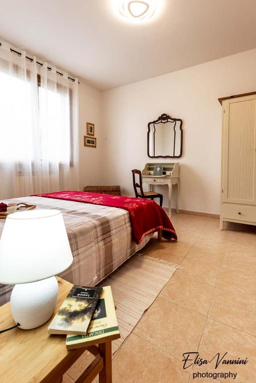 Posteľ alebo postele v izbe v ubytovaní Casa Il Melograno