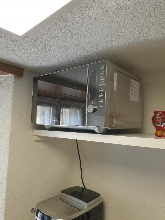 Kuchyň nebo kuchyňský kout v ubytování Mornag AG Ferien Wohnung