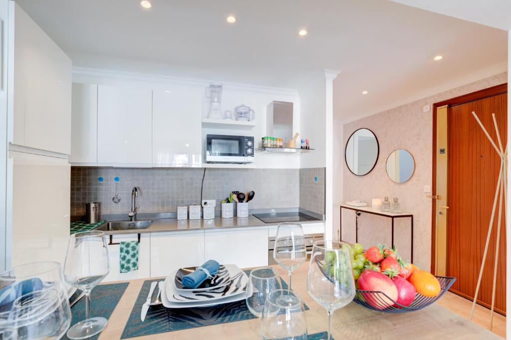 A cozinha ou cozinha compacta de Friendly &amp; designed apartment in the Golden square
