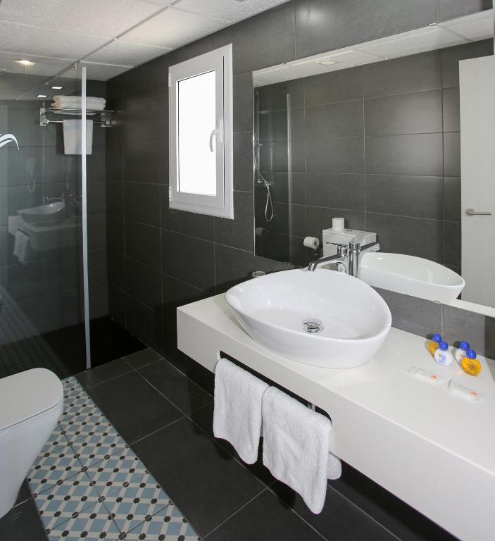 Koupelna v ubytování Hotel Europa Splash & Spa