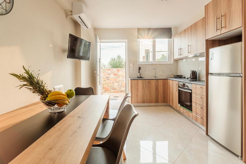 Kuchyň nebo kuchyňský kout v ubytování Kelly's Sunset Apartment 1 Κalamata