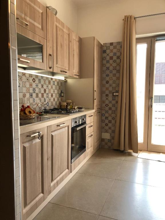Kuchyň nebo kuchyňský kout v ubytování ZEROstuni suite apartment
