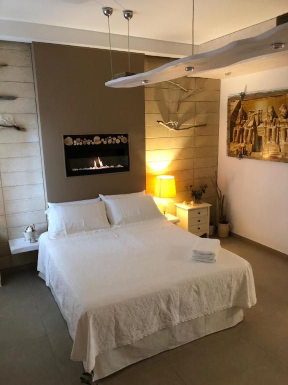 Postel nebo postele na pokoji v ubytování ZEROstuni suite apartment