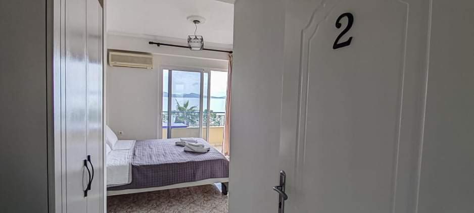 Postel nebo postele na pokoji v ubytování Hotel Klironomi
