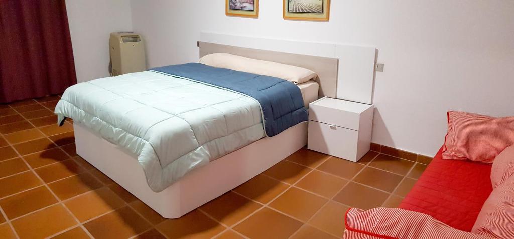 Postel nebo postele na pokoji v ubytování APARTAMENTO MAYI 2