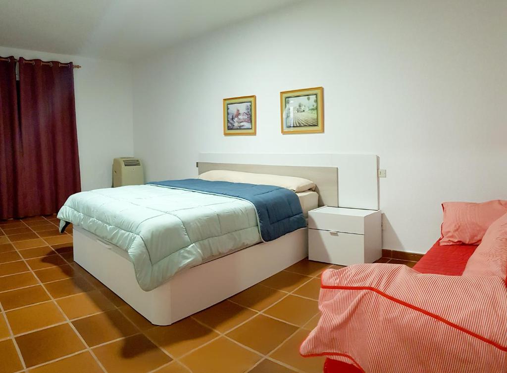 Postel nebo postele na pokoji v ubytování APARTAMENTO MAYI 2