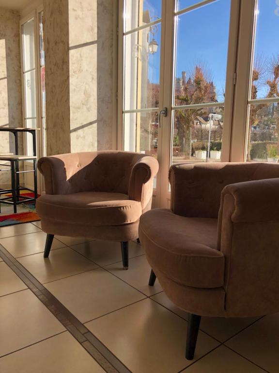 Posezení v ubytování Logis Hotel Beaudon
