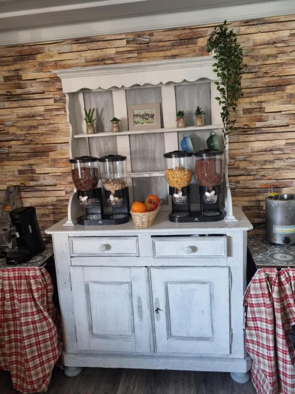 Kuchyň nebo kuchyňský kout v ubytování Hotel et Spa du Scharrach