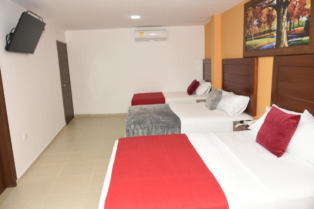 Postel nebo postele na pokoji v ubytování Hotel Kai Soledad Atlántico