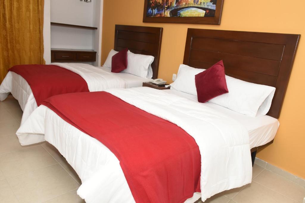 Postel nebo postele na pokoji v ubytování Hotel Kai Soledad Atlántico