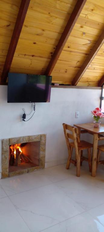 TV a/nebo společenská místnost v ubytování Chale brilho do sol