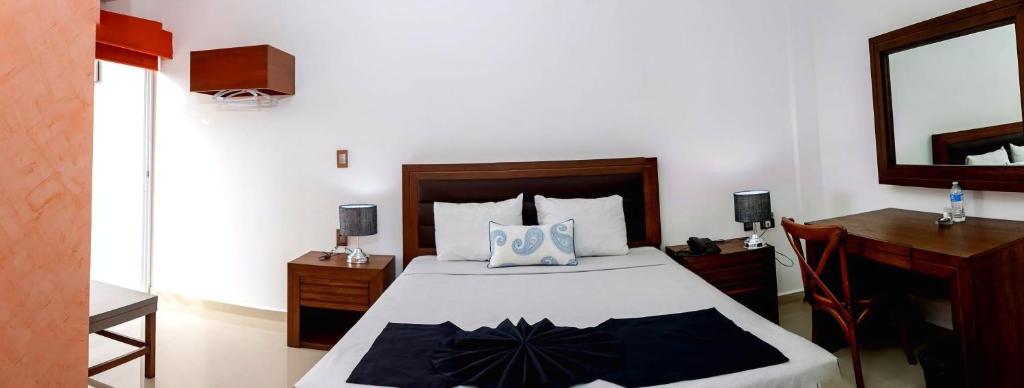 Postel nebo postele na pokoji v ubytování Hotel Boketto