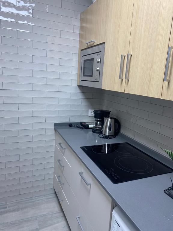 Kuchyňa alebo kuchynka v ubytovaní Apartamento Mariblanca 6