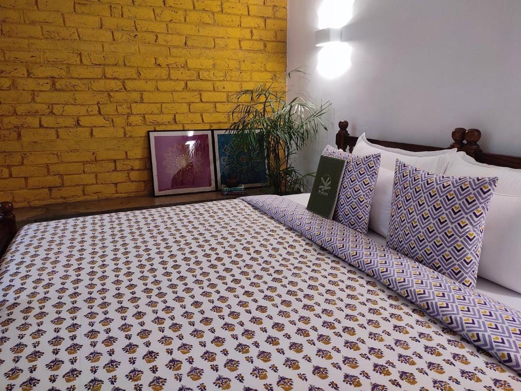 Voodi või voodid majutusasutuse Mukam, Boutique Homestay toas
