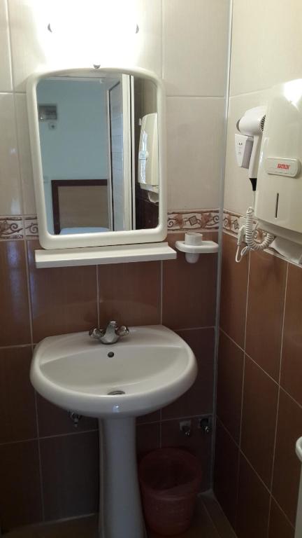 Koupelna v ubytování Caner Hotel
