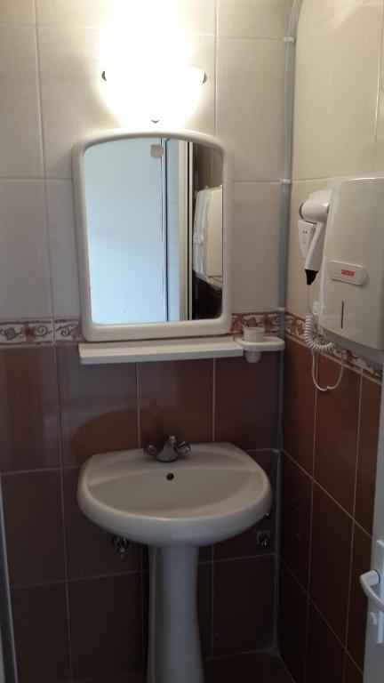 Koupelna v ubytování Caner Hotel