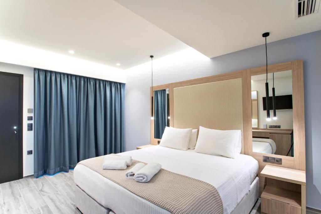 Postel nebo postele na pokoji v ubytování ALTHAEA LUXURY ROOMS