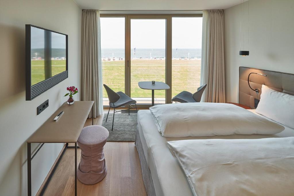 Postel nebo postele na pokoji v ubytování Hotel Misan