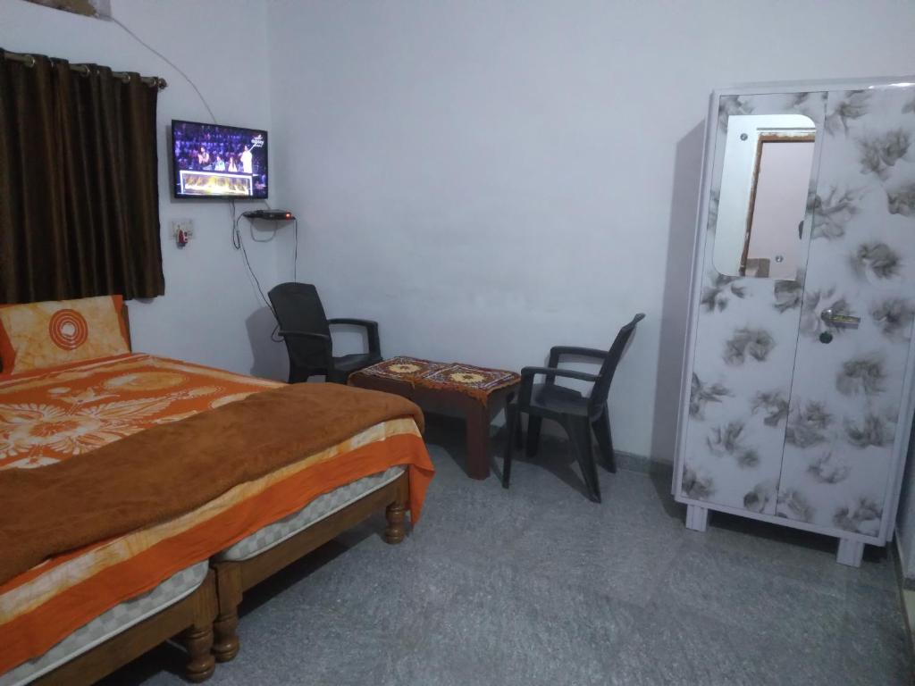 Postel nebo postele na pokoji v ubytování Happy Homestay