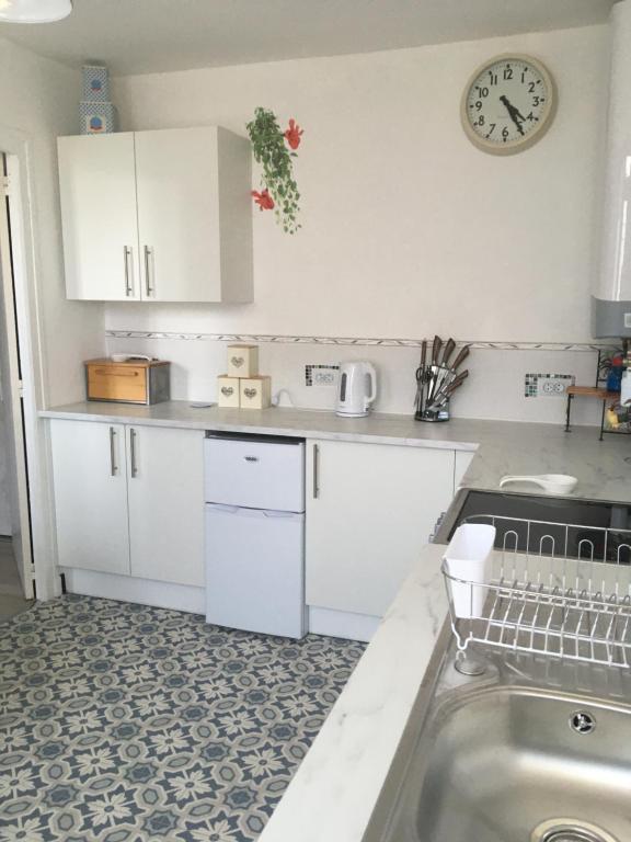 Kuchyň nebo kuchyňský kout v ubytování La Maison Bleue