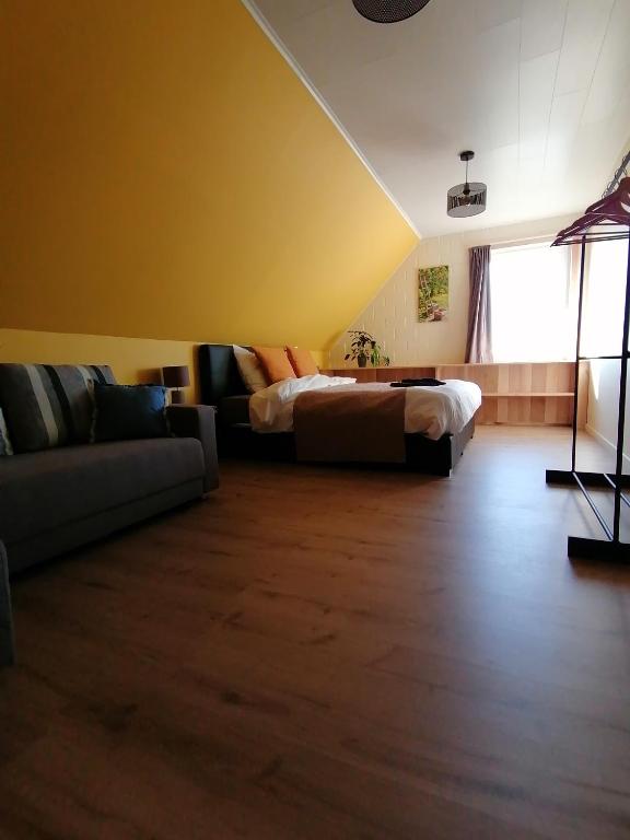 Postel nebo postele na pokoji v ubytování 't Zuden van Aertrycke