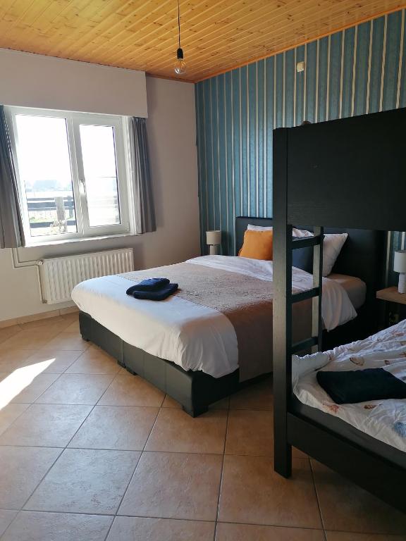 Postel nebo postele na pokoji v ubytování 't Zuden van Aertrycke