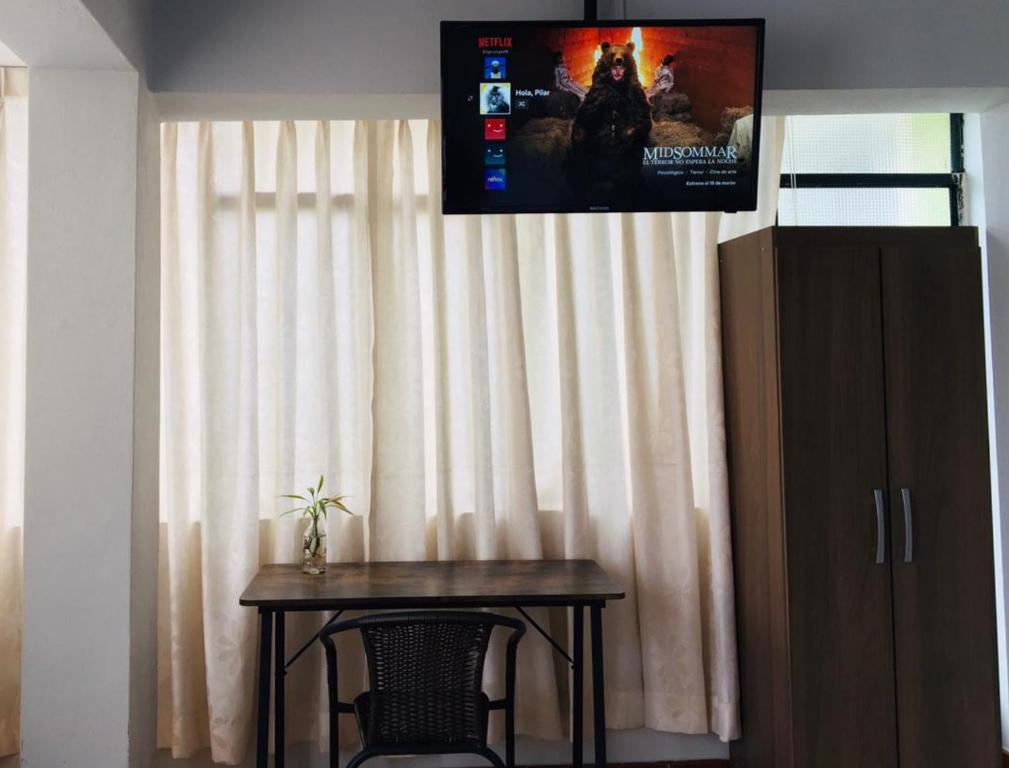 TV a/nebo společenská místnost v ubytování Casa Samaykuy