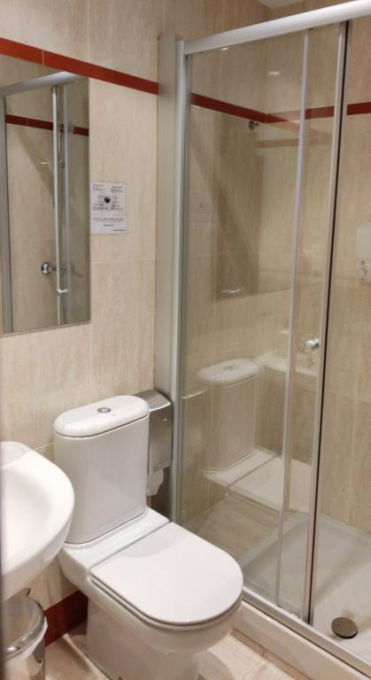 Kúpeľňa v ubytovaní Hotel Cuéntame